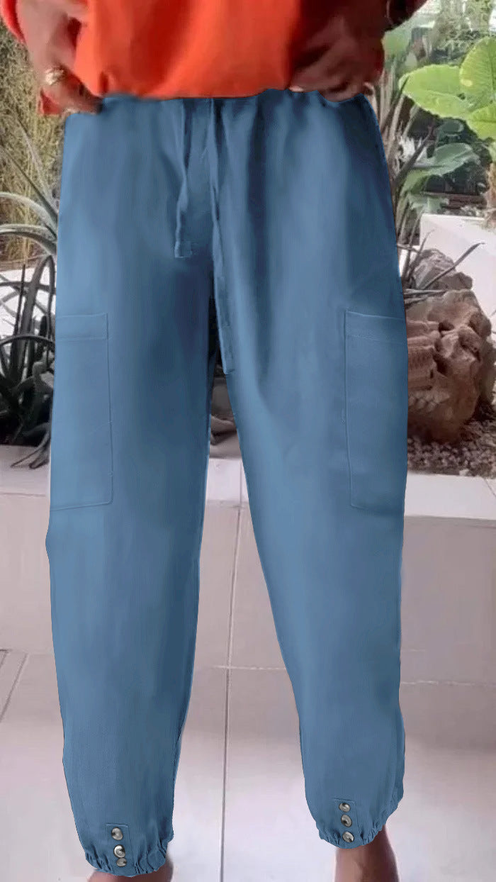 Ladies cargo jogging pants with drawstring, patch pockets and button cuffs Mune Fashion