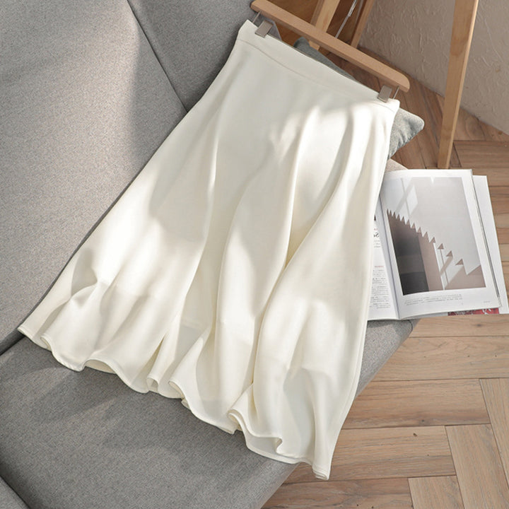 Women Flowing High-Waisted Midi Skirt with Wavy Hem & Light Volume