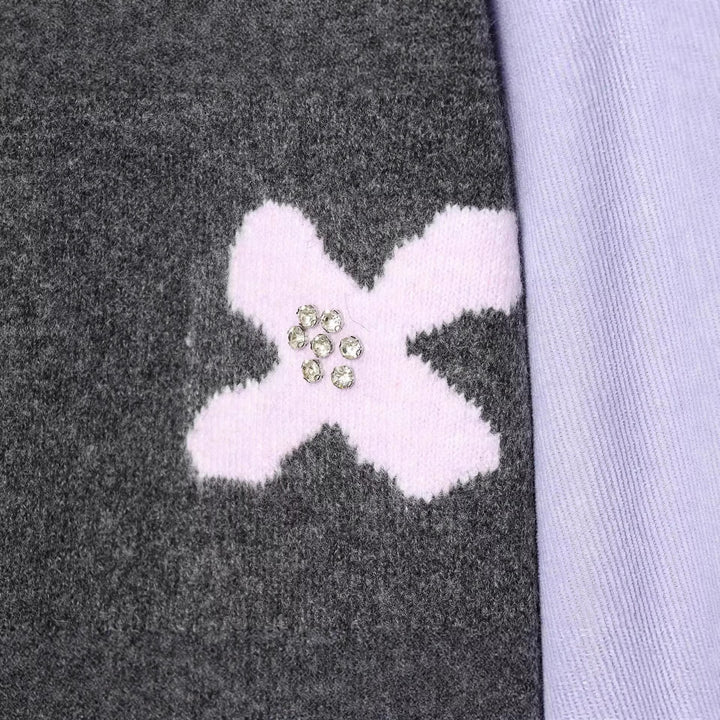Women's knitted cardigan with decorative flower appliqué and contrast sleeves Mune Fashion