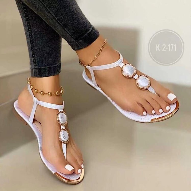 Women's elegant T-strap sandal with multi-part medallion application and adjustable ankle strap Mune Fashion