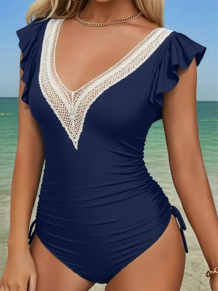 Ladies one-piece swimsuit with sophisticated lace and ruffle details Mune Fashion