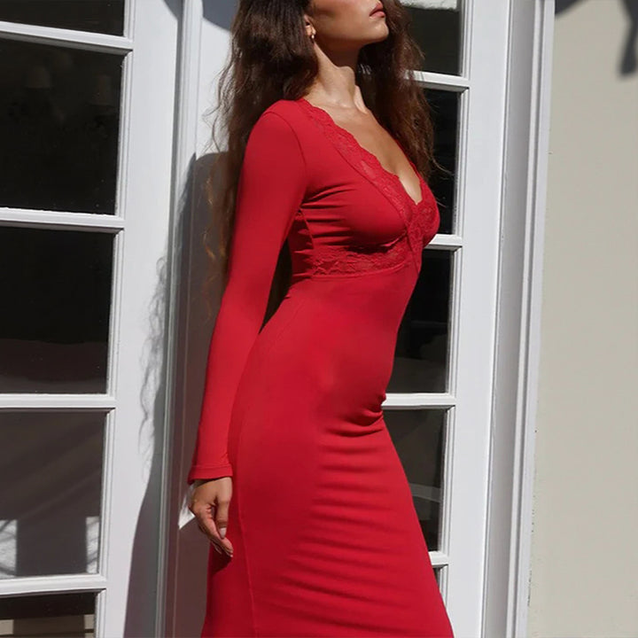 Women's figure-hugging maxi dress with lace bustier, deep V-neck, and tailored empire seam.