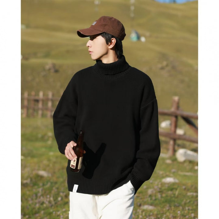 Women Oversized Turtleneck Sweater made of soft cotton blend with ribbed cuffs and extended hem Mune Fashion