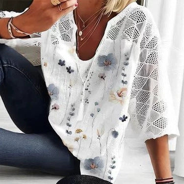 Women's V-neck tunic with lace-knit sleeves and subtle watercolor floral print Mune Fashion