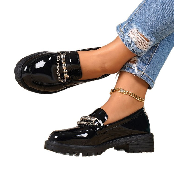 Women’s patent loafers with patterned rubber sole and chain detail Mune Fashion