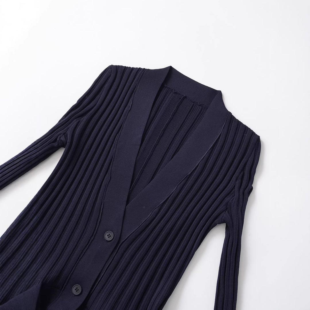 Women's ribbed knit cardigan with shawl collar, fitted flounce hem and button placket Mune Fashion
