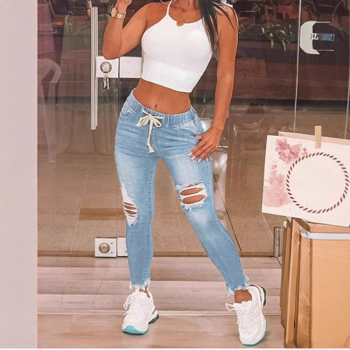 Women High-Waisted Slim Jogger Jeans with Destroyed Inserts and Drawstring Mune Fashion