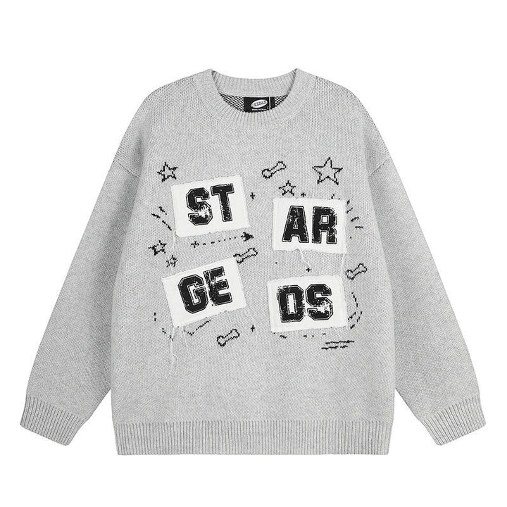 Ladies oversized knit sweater with round neck, appliqués, and vintage letter patches Mune Fashion
