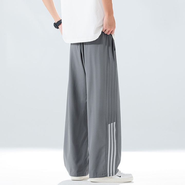 Men's sporty leisure pants with side ventilation openings