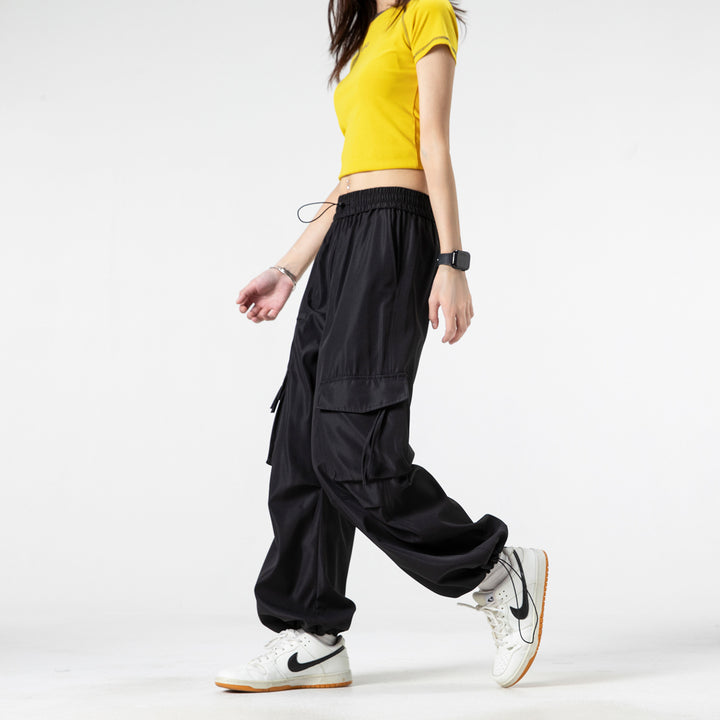 Damen Weite Cargo‑Hose im Baggy‑Cut mit elastischem Tunnelzugbund, Klapp‑Utility‑Taschen und verstellbarem Beinabschluss Mune Fashion