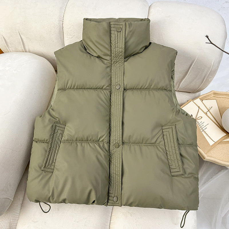 Women's sleeveless padded quilted vest with high stand-up collar and drawstring Mune Fashion