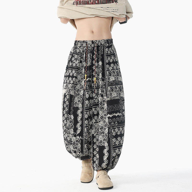 Women's casual pluder pants in ethnic print with elastic waistband, drawstring and smocked cuffs Mune Fashion