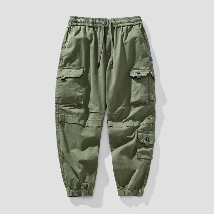 Herren Leichte Canvas-Cargohose im Joggerstil mit elastischem Bund, segmentierten Kniepaneelen und verdeckten Klappentaschen Mune Fashion