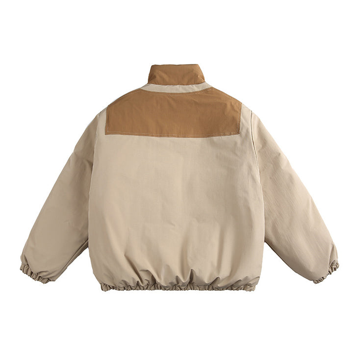 Unisex Boxy padded stand-up collar jacket with contrast panels, vertical chest zippers, and large flap pockets Mune Fashion