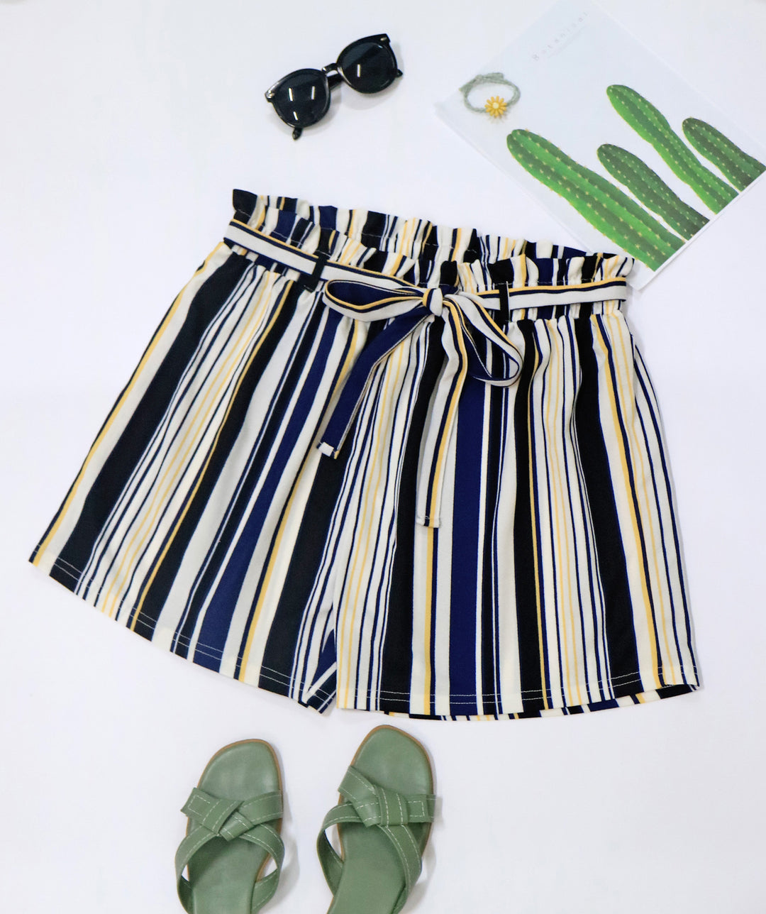 Women's striped summer shorts with elastic waistband and waist tie.