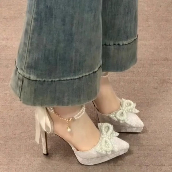Ladies' satin pumps with lace overlay, pearl bow appliqué, and pearl lacing Mune Fashion