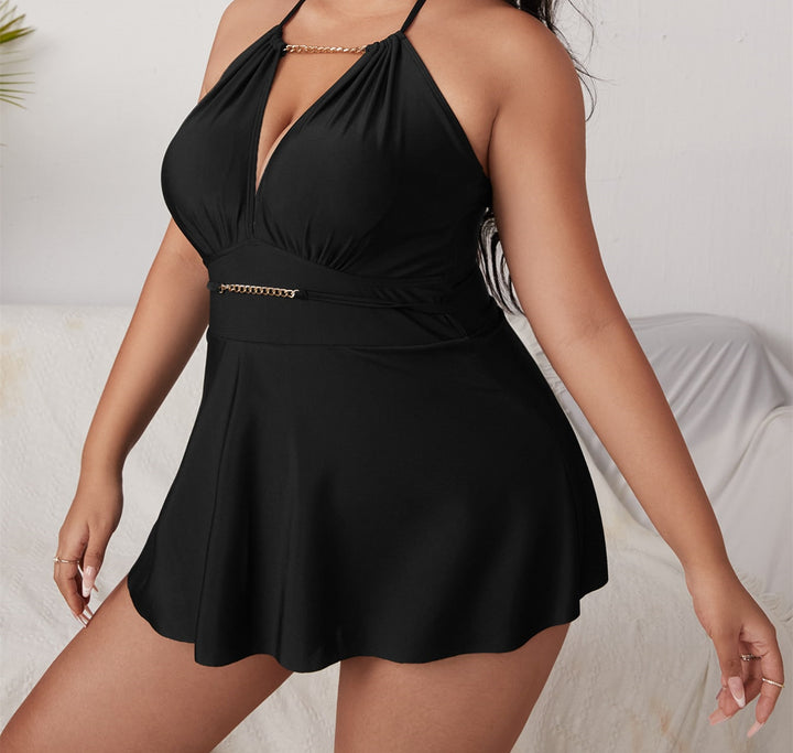Women's beach dress with deep V-neck and decorative chain detail Mune Fashion