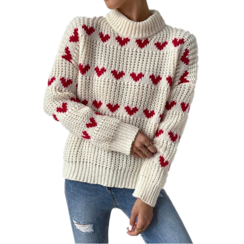 Women's chunky knit sweater with knitted heart patterns, high stand-up collar, and relaxed oversized silhouette Mune Fashion