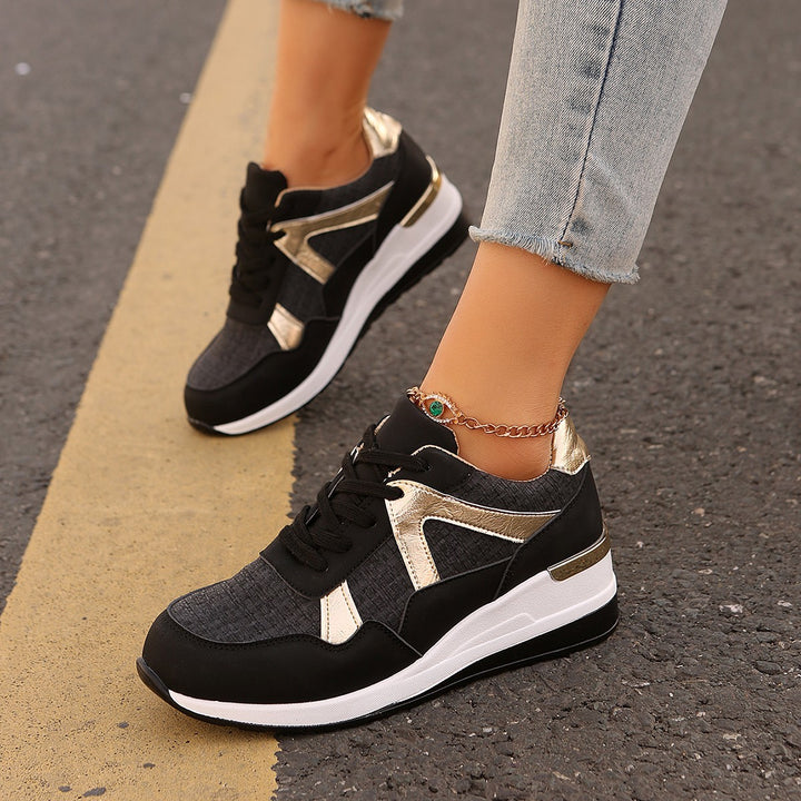 Ladies sporty wedge sneakers with padded memory footbed and elegant metallic accents Mune Fashion
