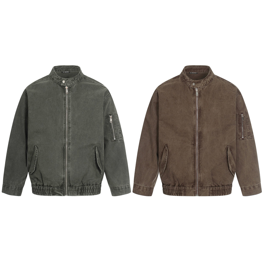 Men's short cut vintage-wash bomber jacket in boxy cut with stand-up collar and sleeve zip.