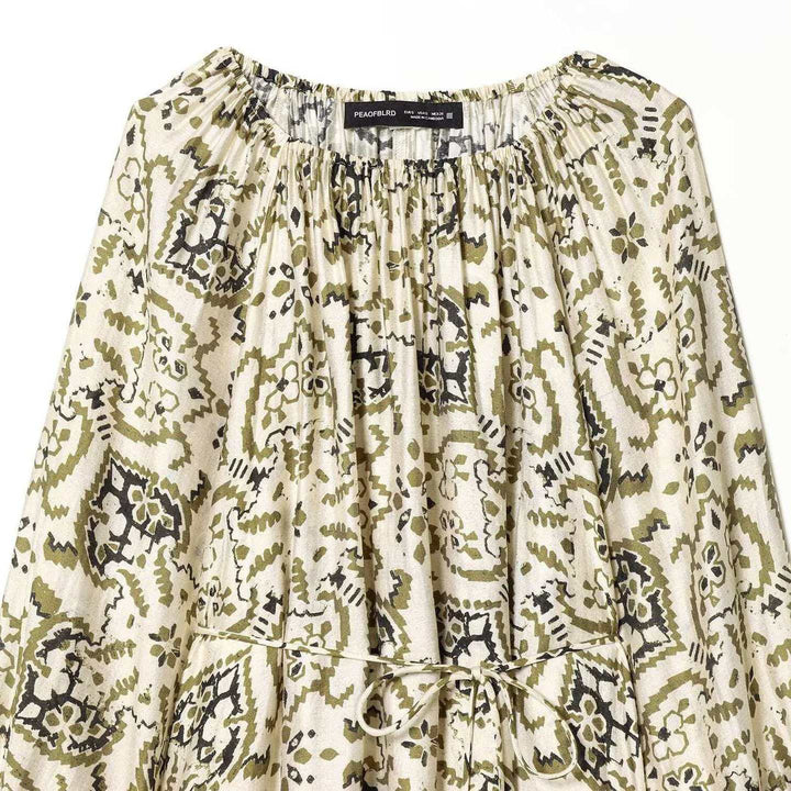 Women’s airy pleated dress with a Carmen collar, wide balloon sleeves, and adjustable drawstring Mune Fashion