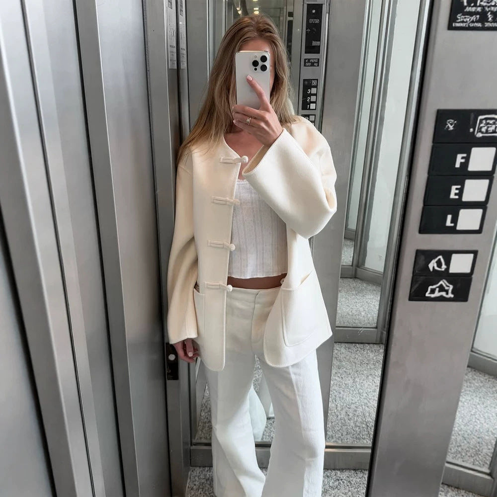 Women's short coat with Chinese toggle closures, oversized sleeves, and patch pockets Mune Fashion