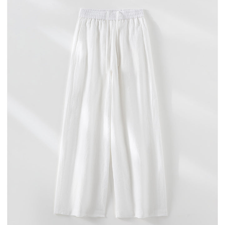 Women's wide linen look trousers with high elastic waistband and flowing wide leg silhouette Mune Fashion