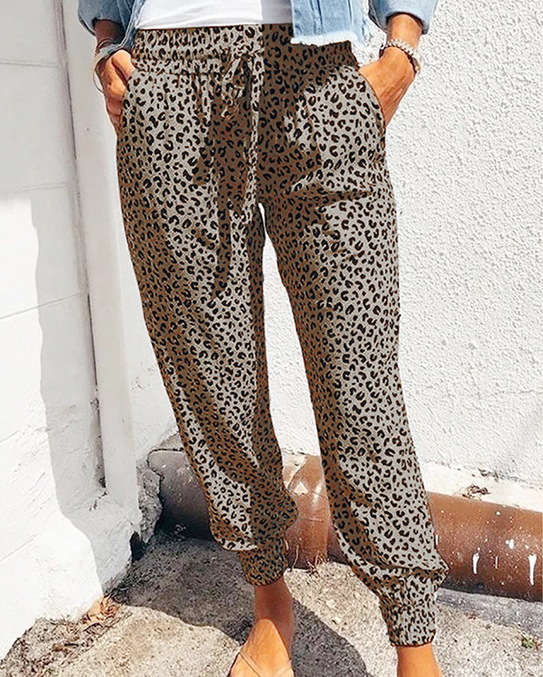 Ladies casual leopard print jogging pants with drawstring, side pockets, and elastic cuffs Mune Fashion
