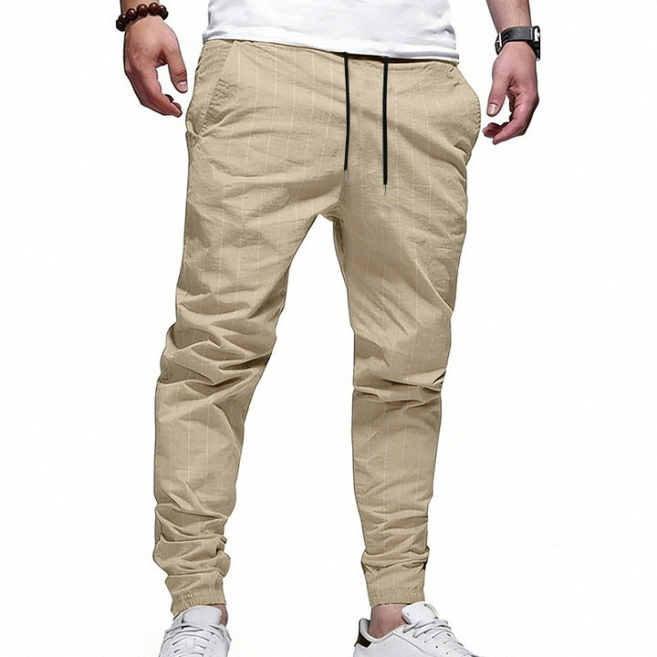 Men's striped jogging pants in linen look with drawstring and narrow tapered cuffs Mune Fashion