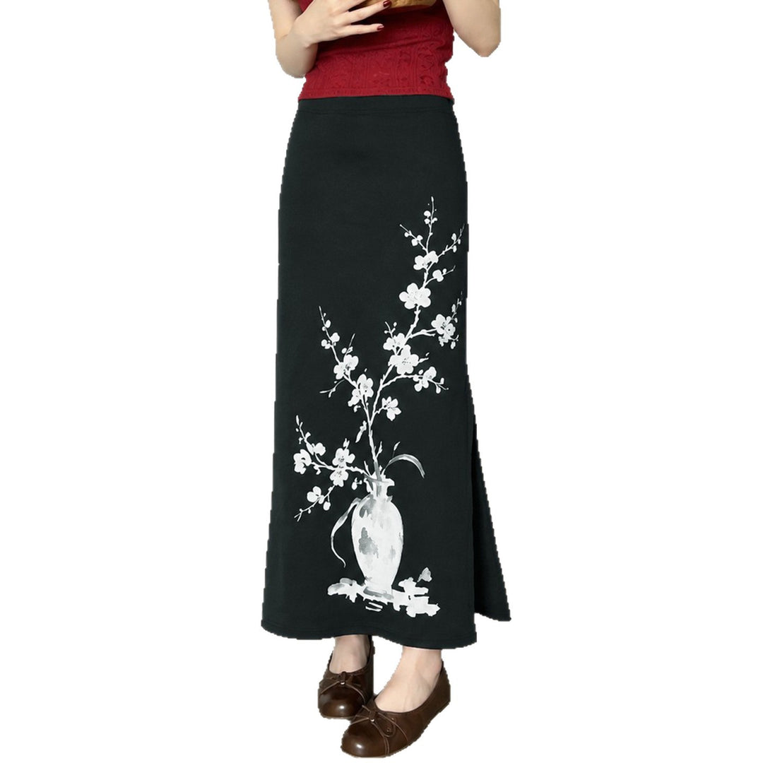 Women's flared maxi skirt with A-line cut, elastic waistband, and floral watercolor vase print Mune Fashion