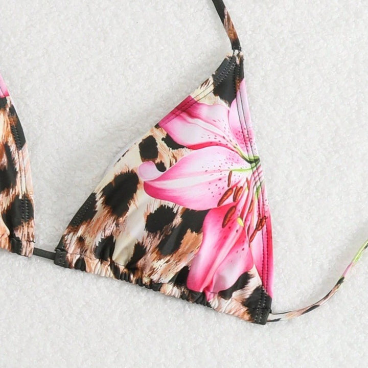 Women's bikini set with elegant leopard pattern and playful floral details Mune Fashion