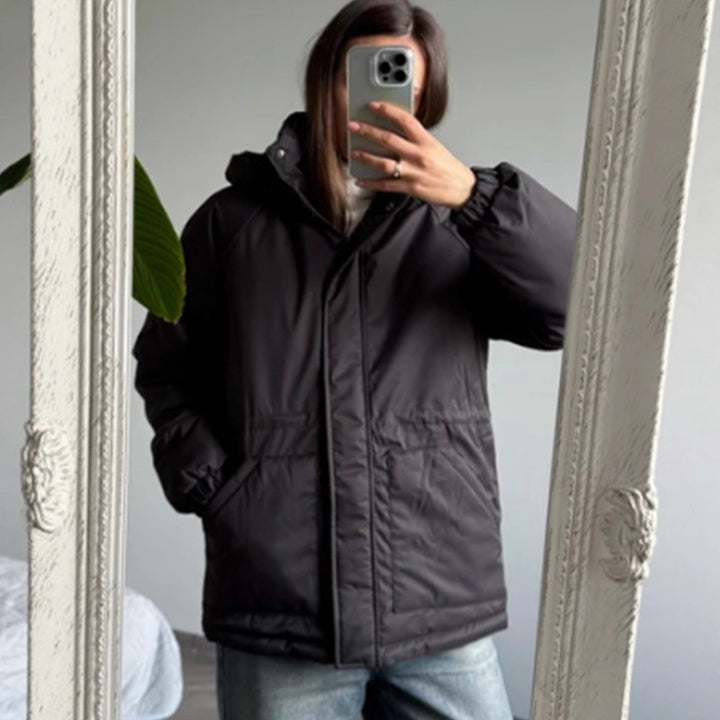 Women’s quilted parka with high collar, fitted drawstring and hood Mune Fashion