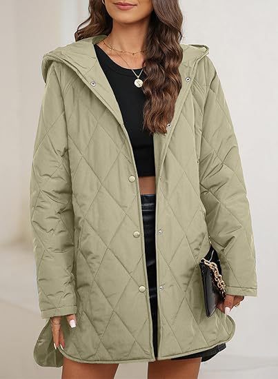 Women's quilted hooded jacket with snap button placket, side slits, and medium length Mune Fashion