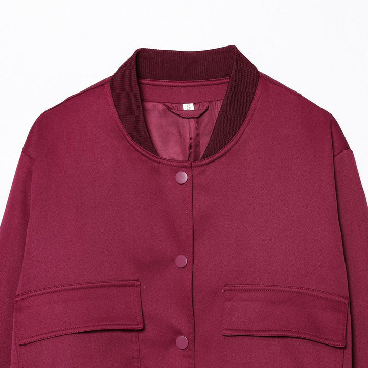 Women's cropped bomber jacket with snap button placket, dropped shoulders and large flap pockets Mune Fashion