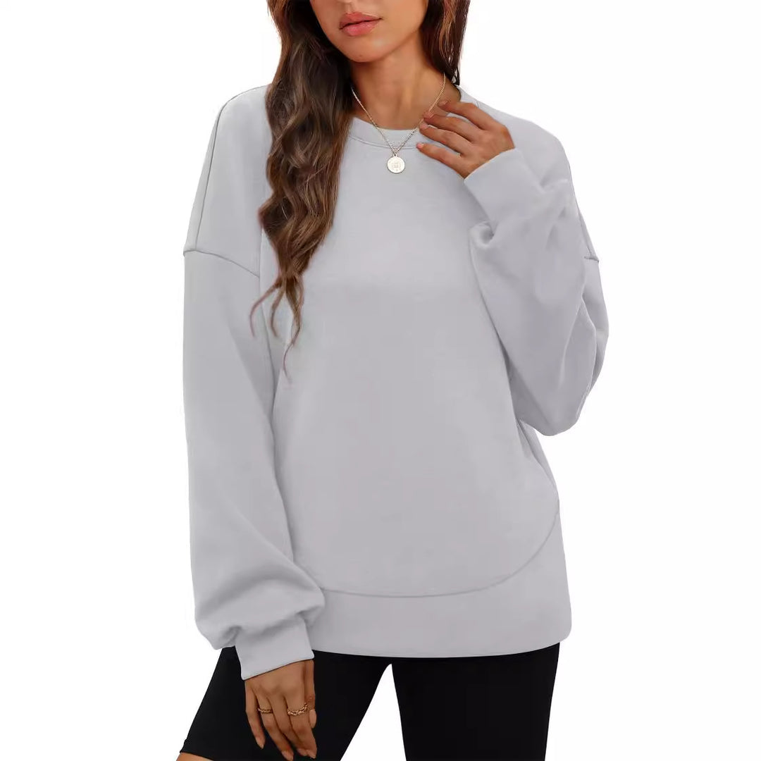 Women's casual oversized round neck sweatshirt with dropped shoulder, rounded hem, and soft inner lining Mune Fashion