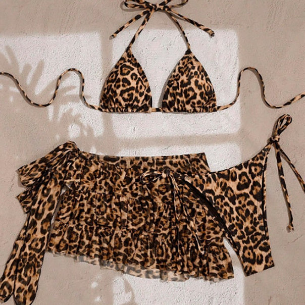 Ladies triangle bikini with elaborately ruffle details and floral over skirt Mune Fashion