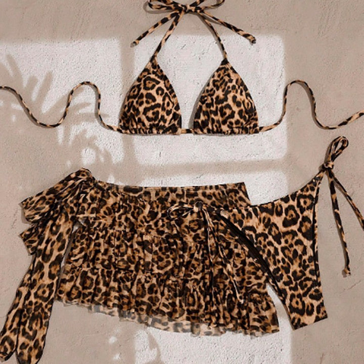Ladies triangle bikini with elaborately ruffle details and floral over skirt Mune Fashion