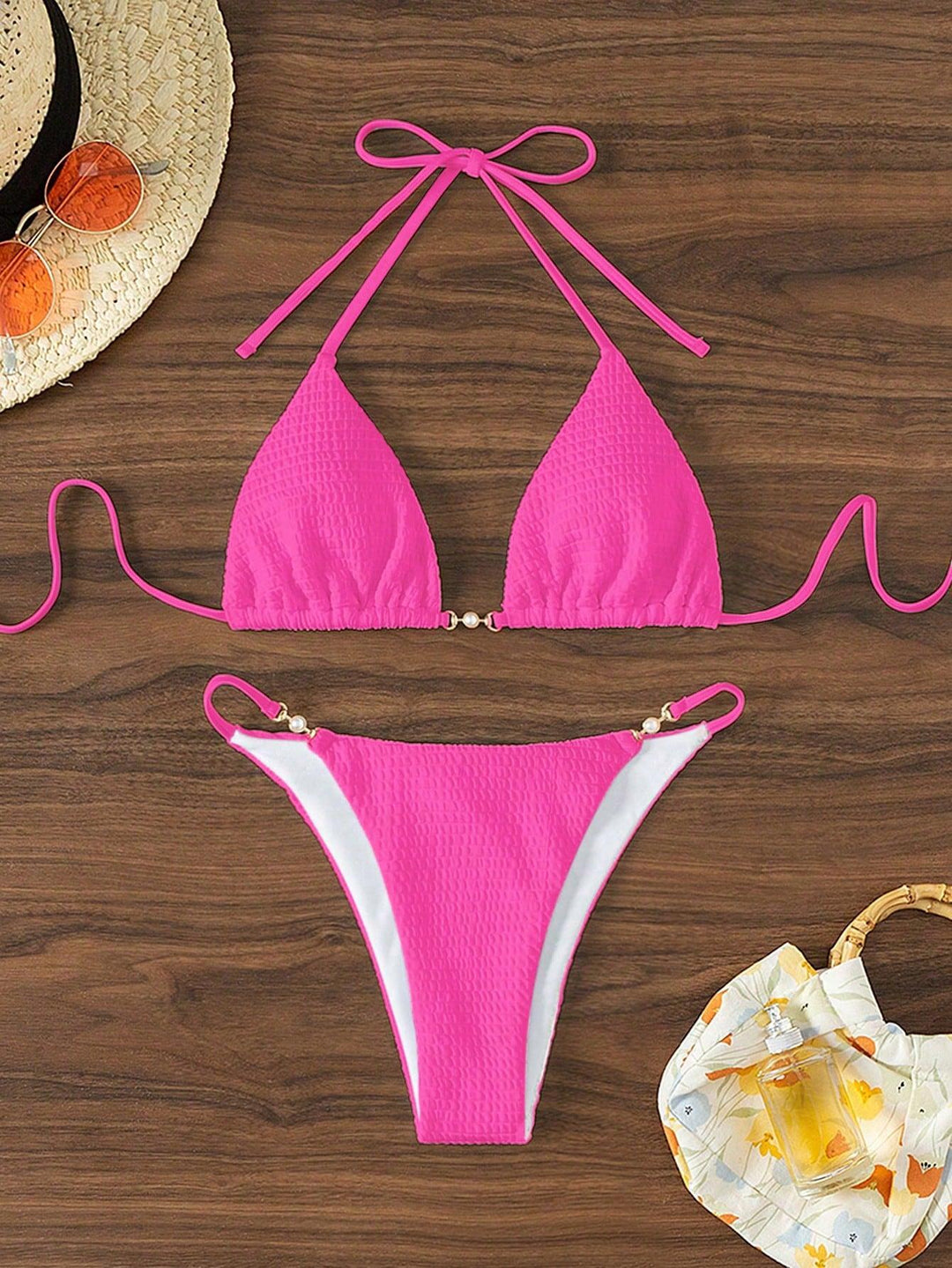 Women's Triangle Bikini with fashionable lacing details and elegant accents Mune Fashion