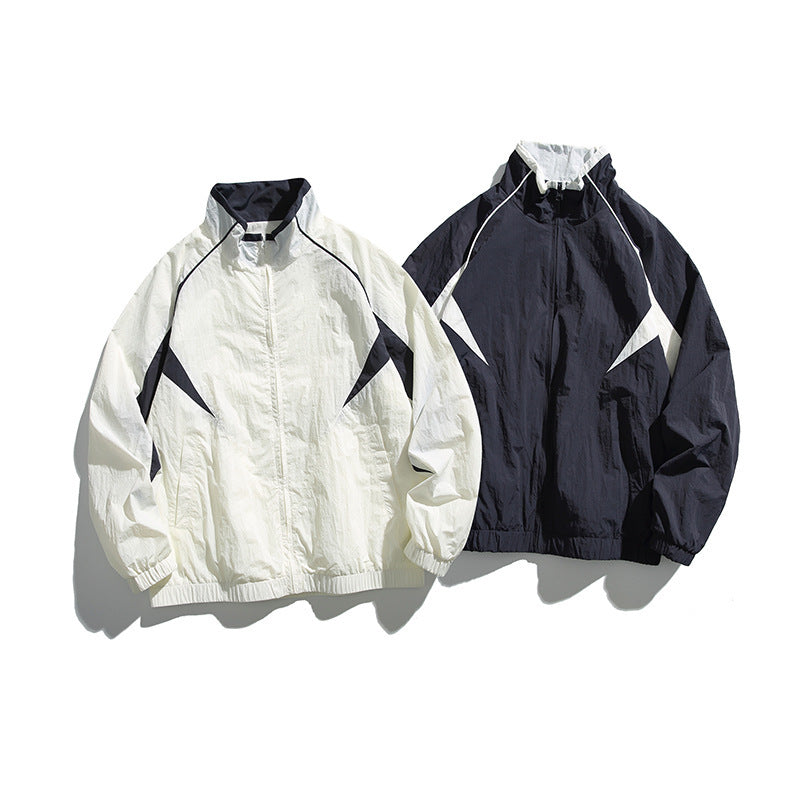 Unisex Lightweight Boxy Hooded Jacket in Windbreaker Style with Contrast Panels and Raglan Sleeves Mune Fashion