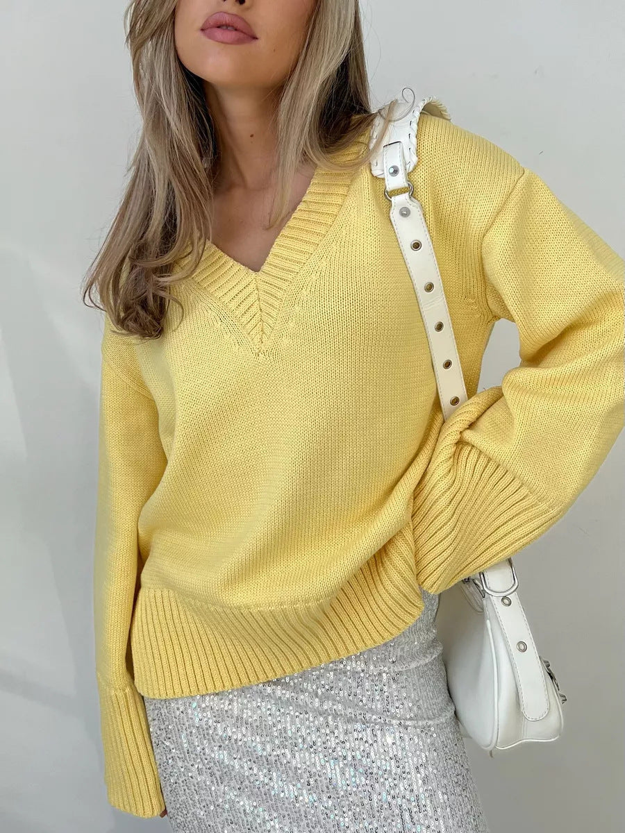Women’s oversized fine knit sweater with deep V-neckline, ribbed cuffs and loose silhouette Mune Fashion