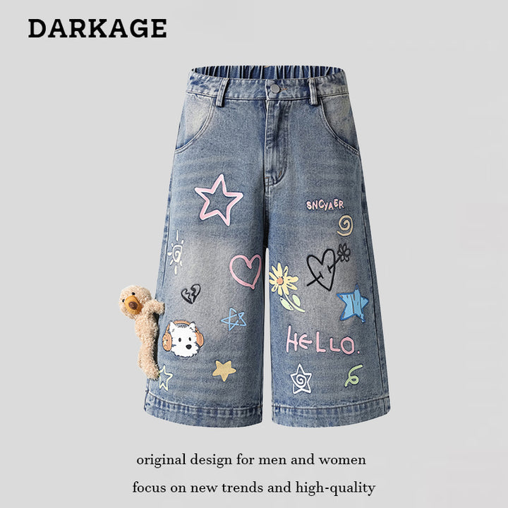 Women's playful denim culotte shorts with a high comfort waistband, allover doodle print & teddy pendant Mune Fashion
