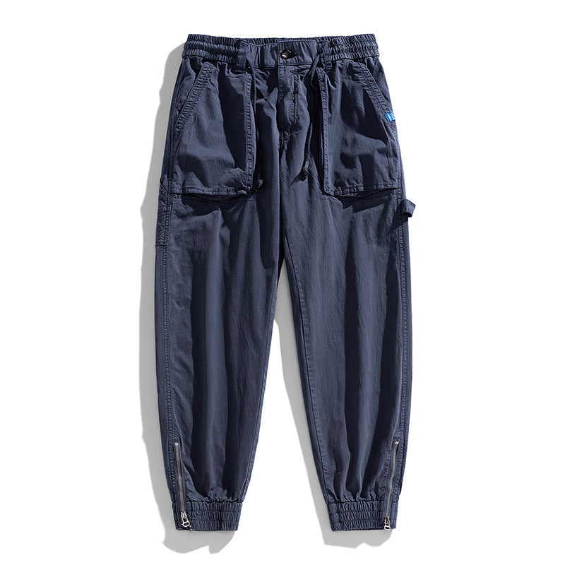 Men's workwear cargo pants in tech jogger style with applied front pockets, hammer loop, and ankle zippers Drune