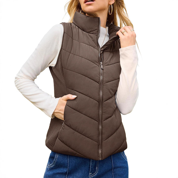 Women's quilted thermo vest with high stand-up collar and elastic side inserts Mune Fashion