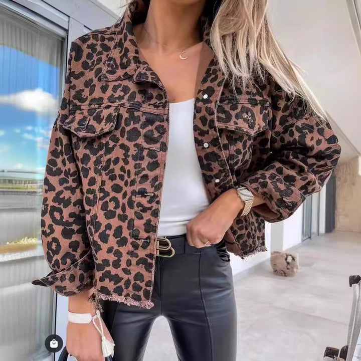 Women's cropped oversized denim jacket with leopard print, patch chest pockets, and raw hem Mune Fashion