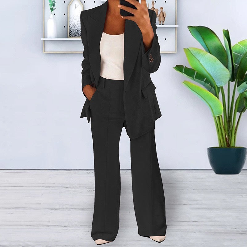 Women’s office-appropriate pantsuit set with wide trousers and tailored blazer Mune Fashion
