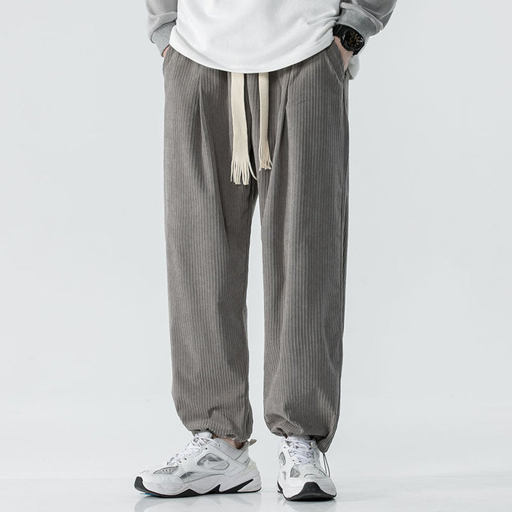 Men's loose-fitting corduroy pants with wide leg, elastic waistband and decorative drawstring Mune Fashion
