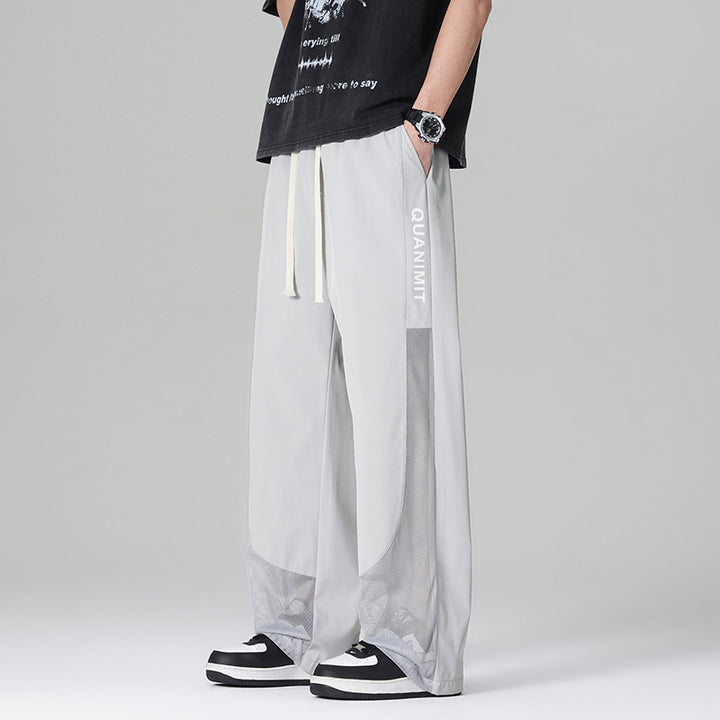 Men's sporty leisure pants with mesh inserts