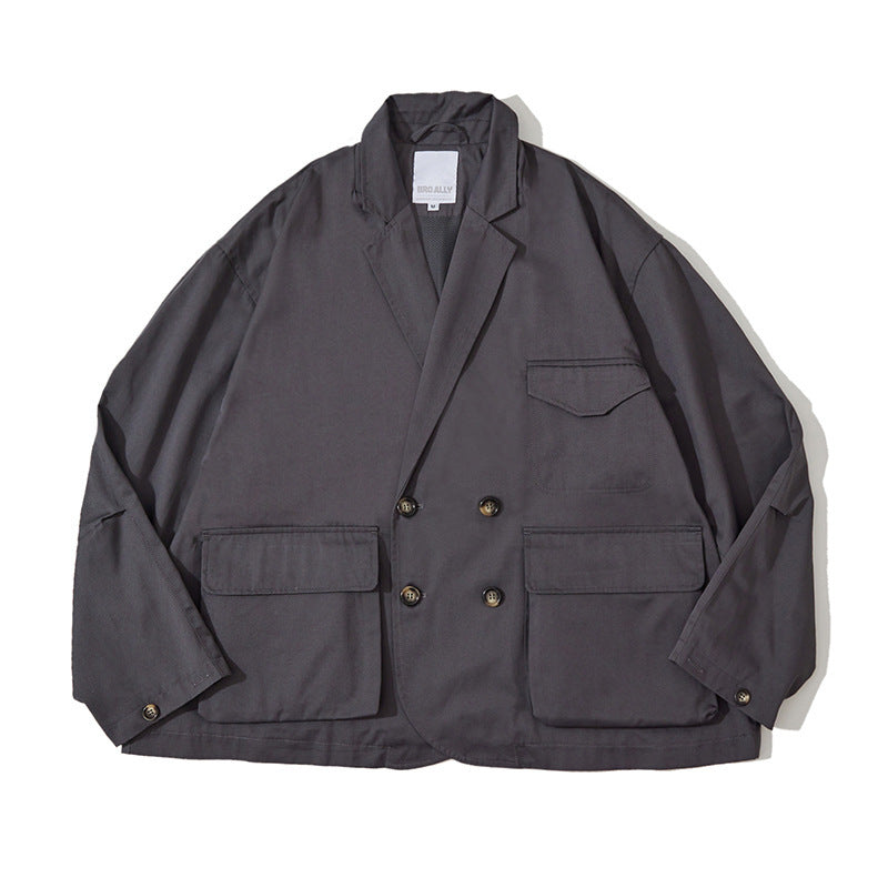 Unisex Boxy Overjacket with double-breasted button placket, large utility patch pockets and short boxy cut Mune Fashion