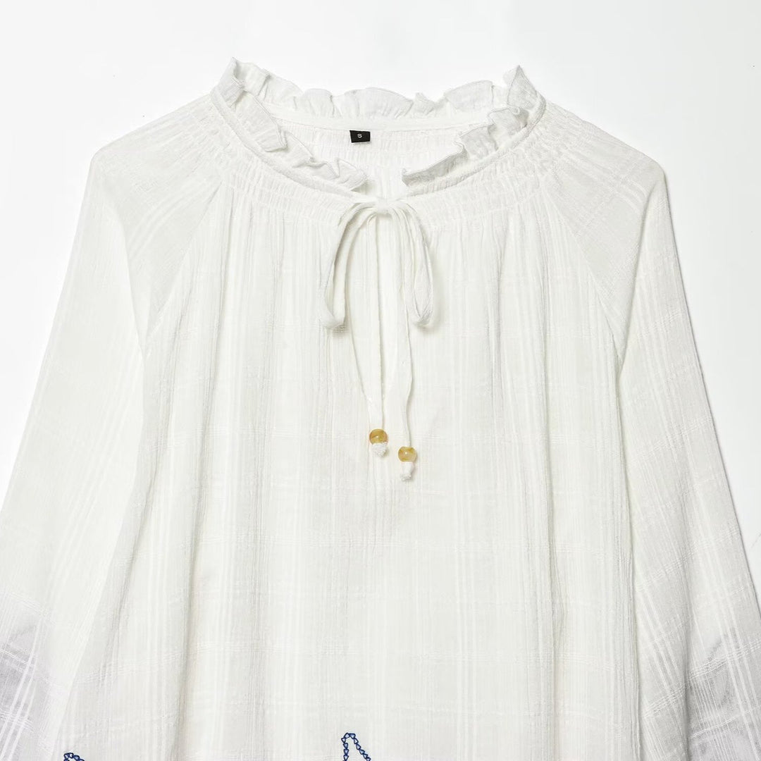 Women's embroidered cotton tunic with ruffle collar, smocking details and tie band