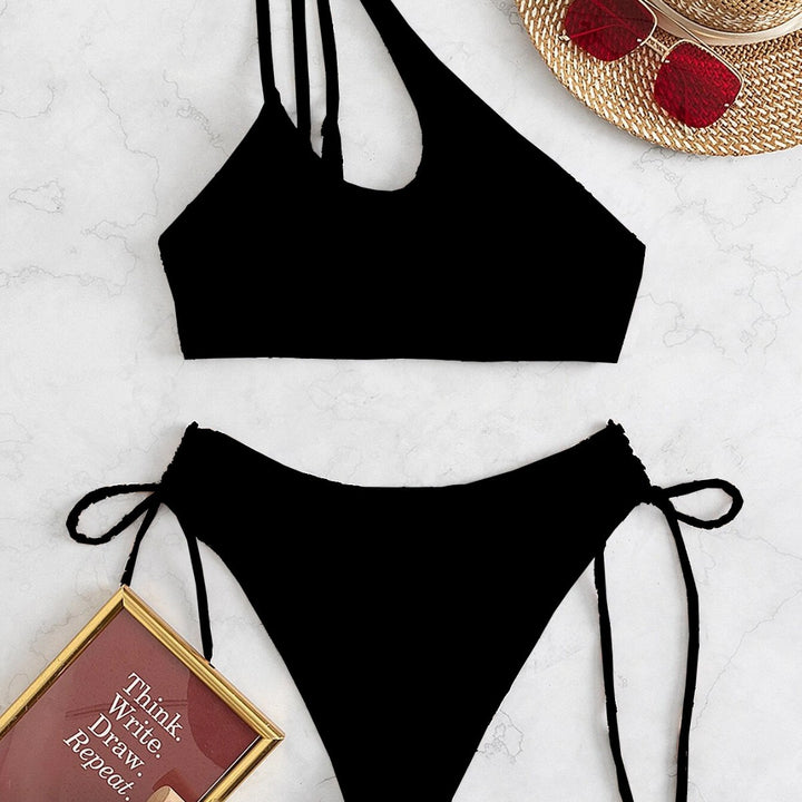 Women's bikini set with asymmetric top and side lacing Mune Fashion